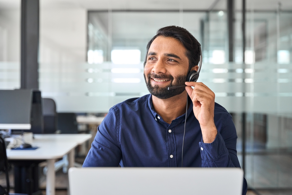 Smiling,Happy,Indian,Call,Center,Agent,Wearing,Headset,Talking,To